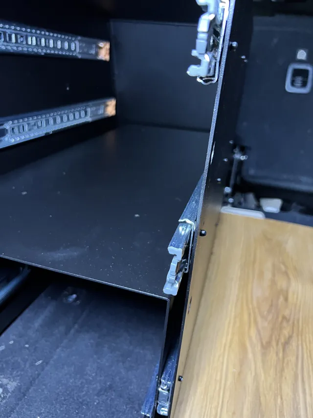 Close-up of telescopic rails and drawers inside the kitchen